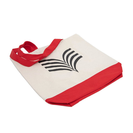 Canvas tote bag with red trim and black logo on a white background